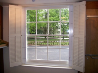 Window security grilles neatly retracted
