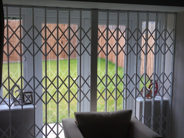 Security grilles for T-shaped window door