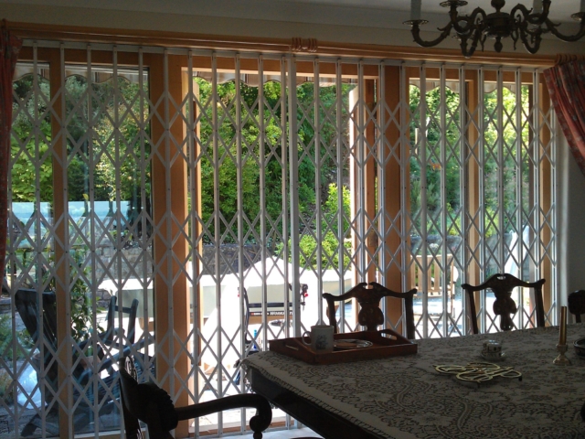 Concertina security grilles for patio door