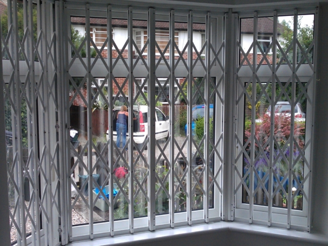 Concertina Security grilles on bay window