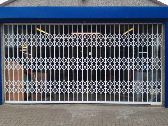 Collapsible security grilles