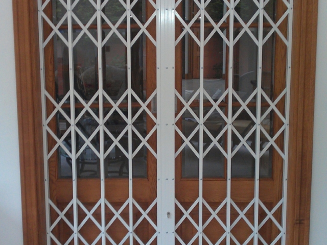 Concertina security grilles