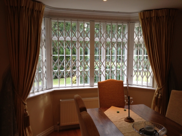 Internal security shutters for bay window