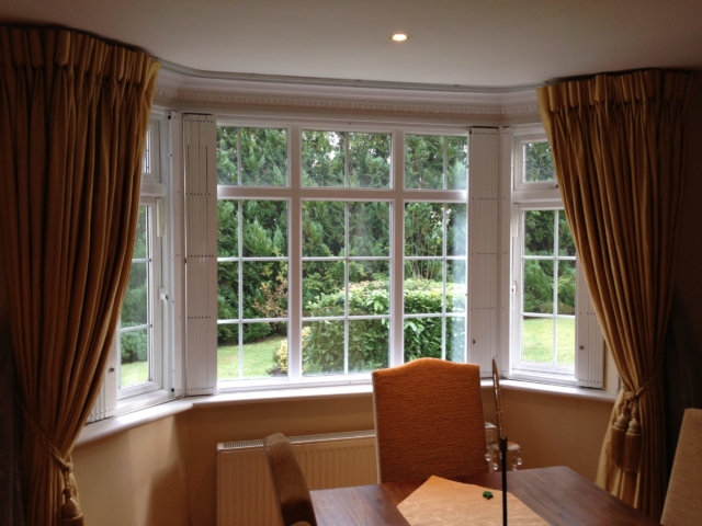 Sliding security shutters for bay window