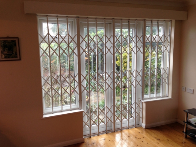 Security grilles for T-shaped window door