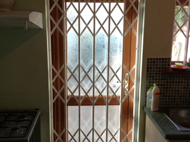 Domestic security shutters for patio door