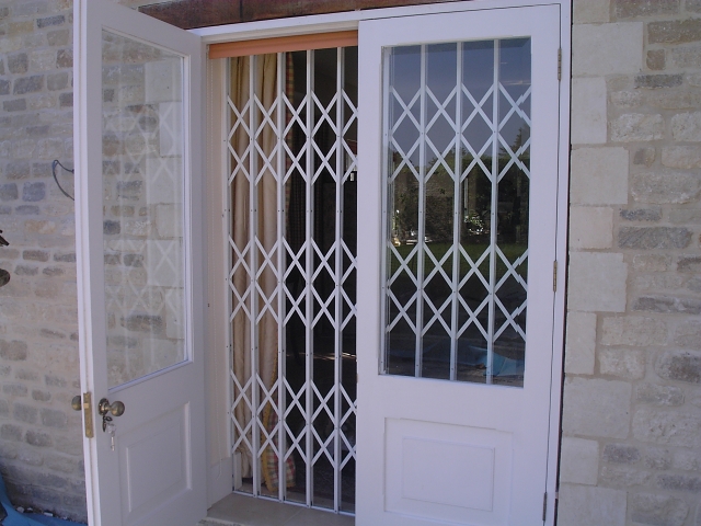 Internal security shutters for patio door