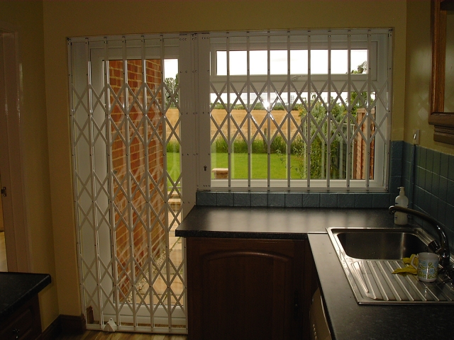 Security grilles for flag shaped kitchen window door