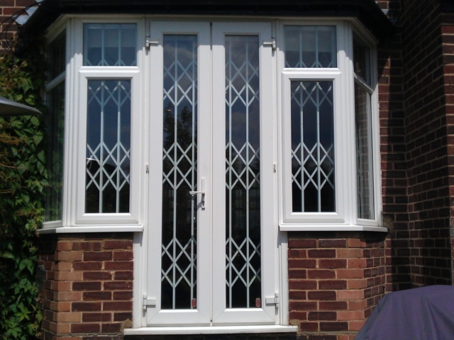 Security grilles for T-shaped home window / door