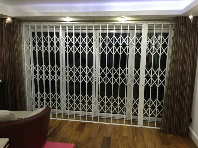 Security grilles with low profile track