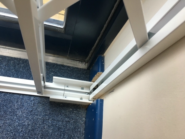 Security grilles using Lift out track