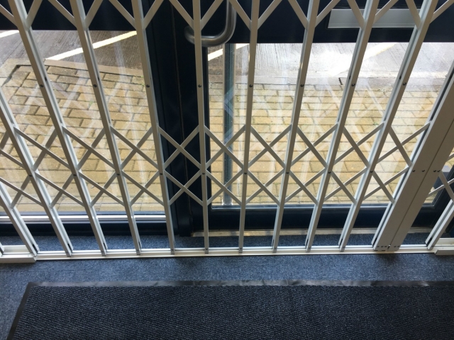Commercial security shutter with lift out track
