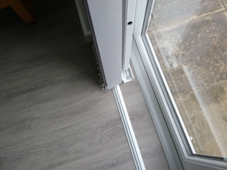 Removable track for sliding security grilles Removable track for sliding security grilles